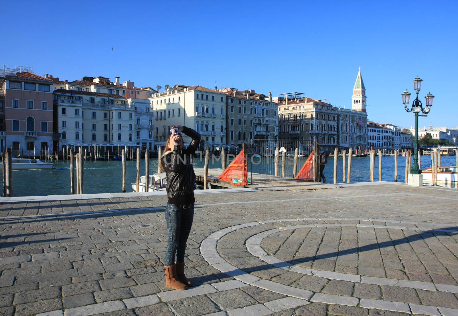 Girl taking photo in Venice,Italy