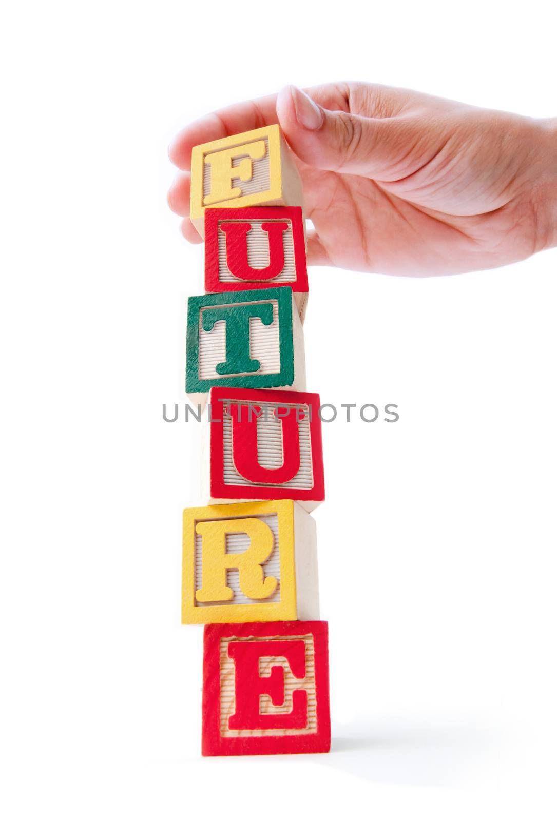 Building blocks being stacked to create the word future 