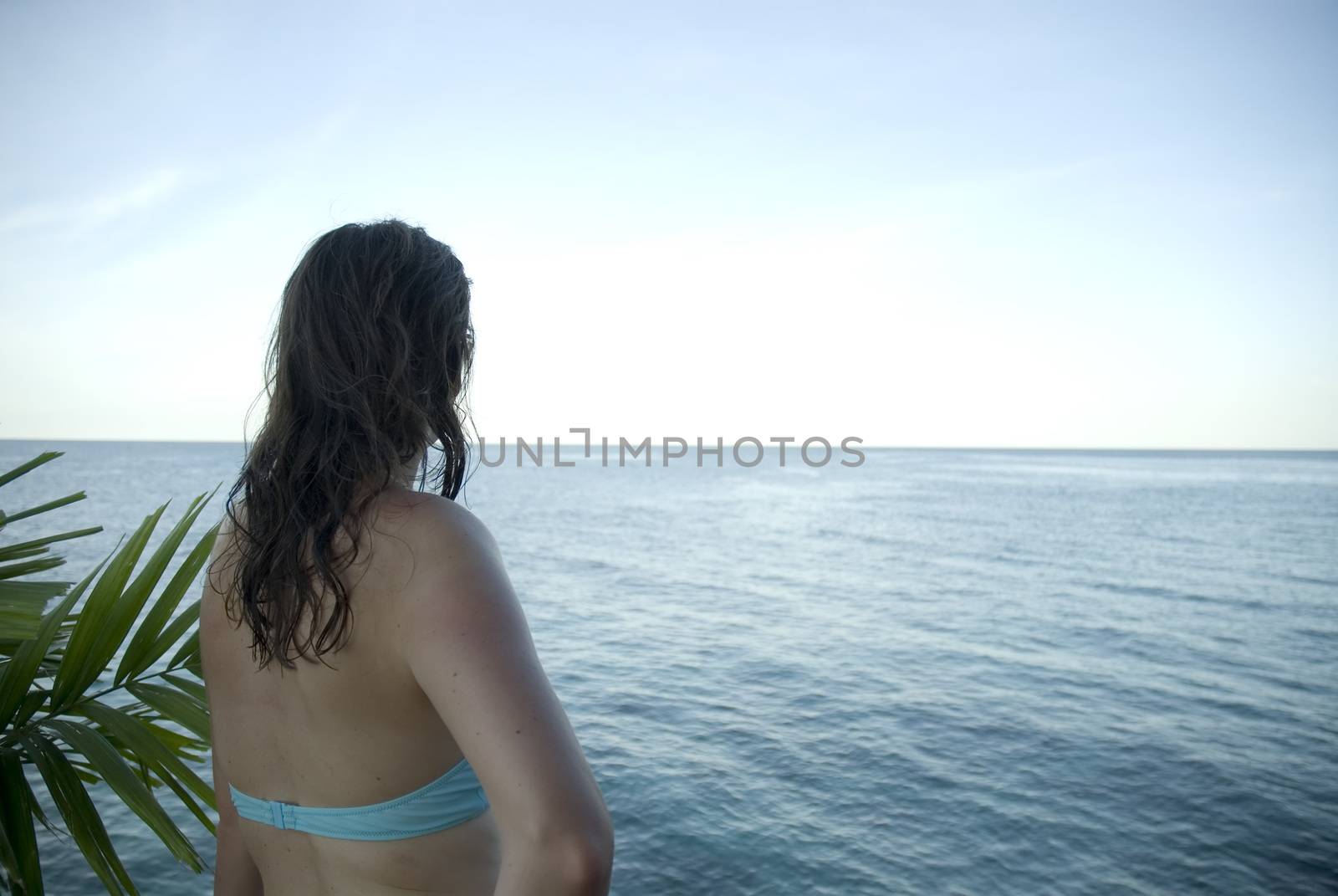 An attractive woman enjoying the sun shine in the tropics