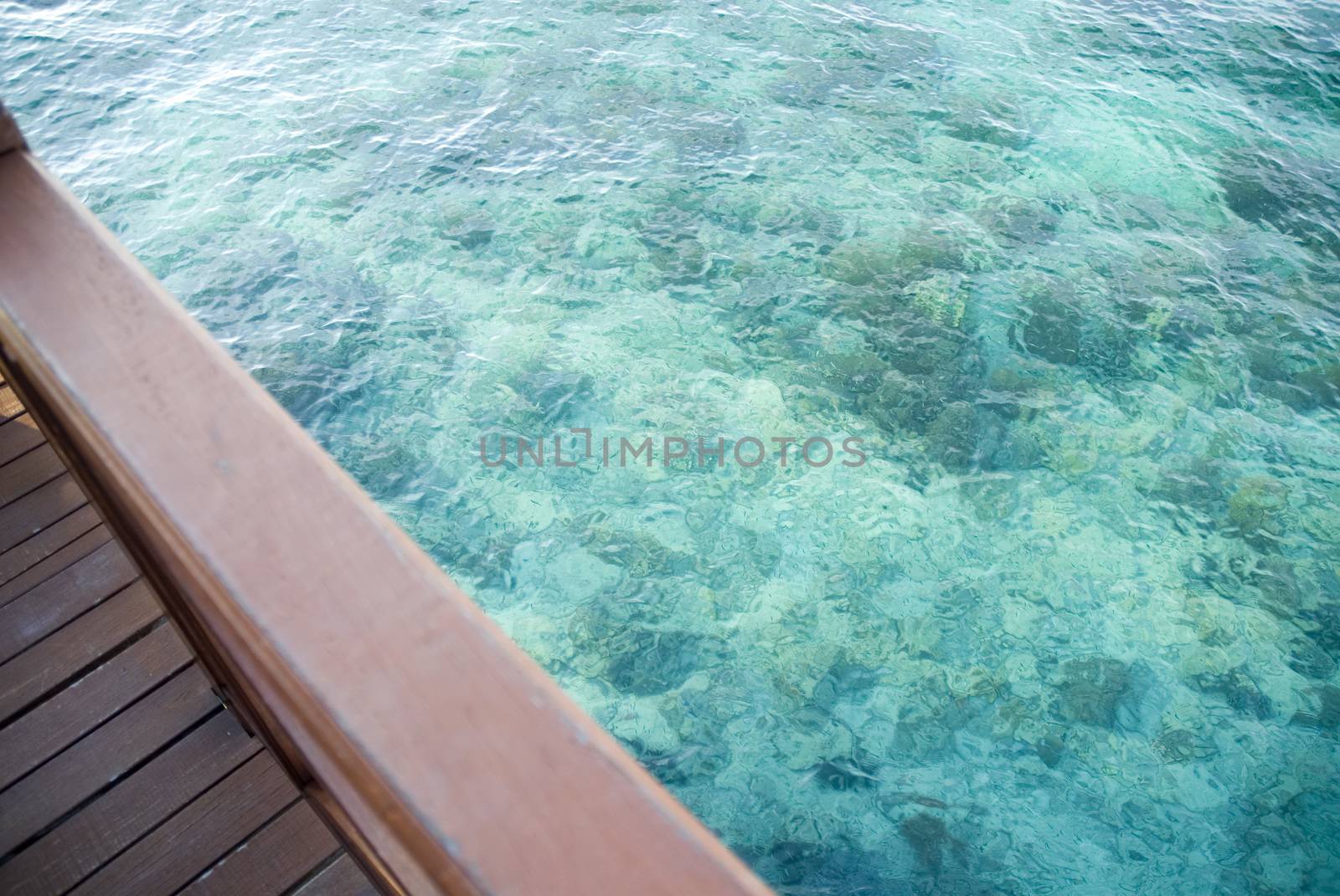 A scene displaying the tropical water found in Mabul, Borneo