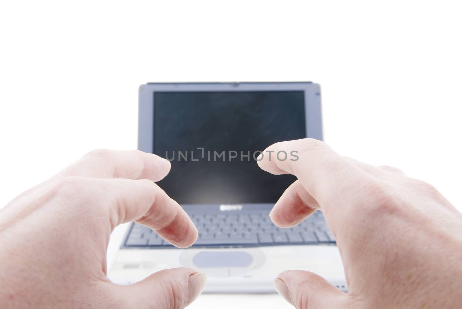 Hands and Silver Laptop by seawaters