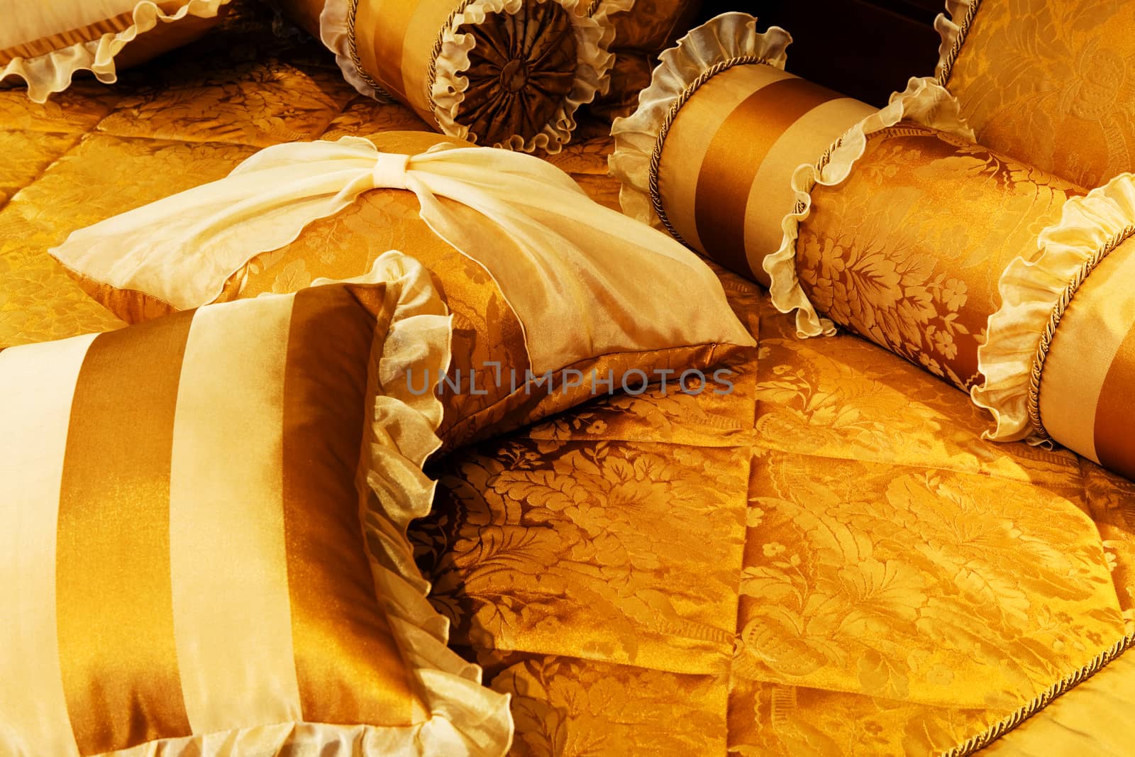 beautiful yellow pillows on the beds of modern