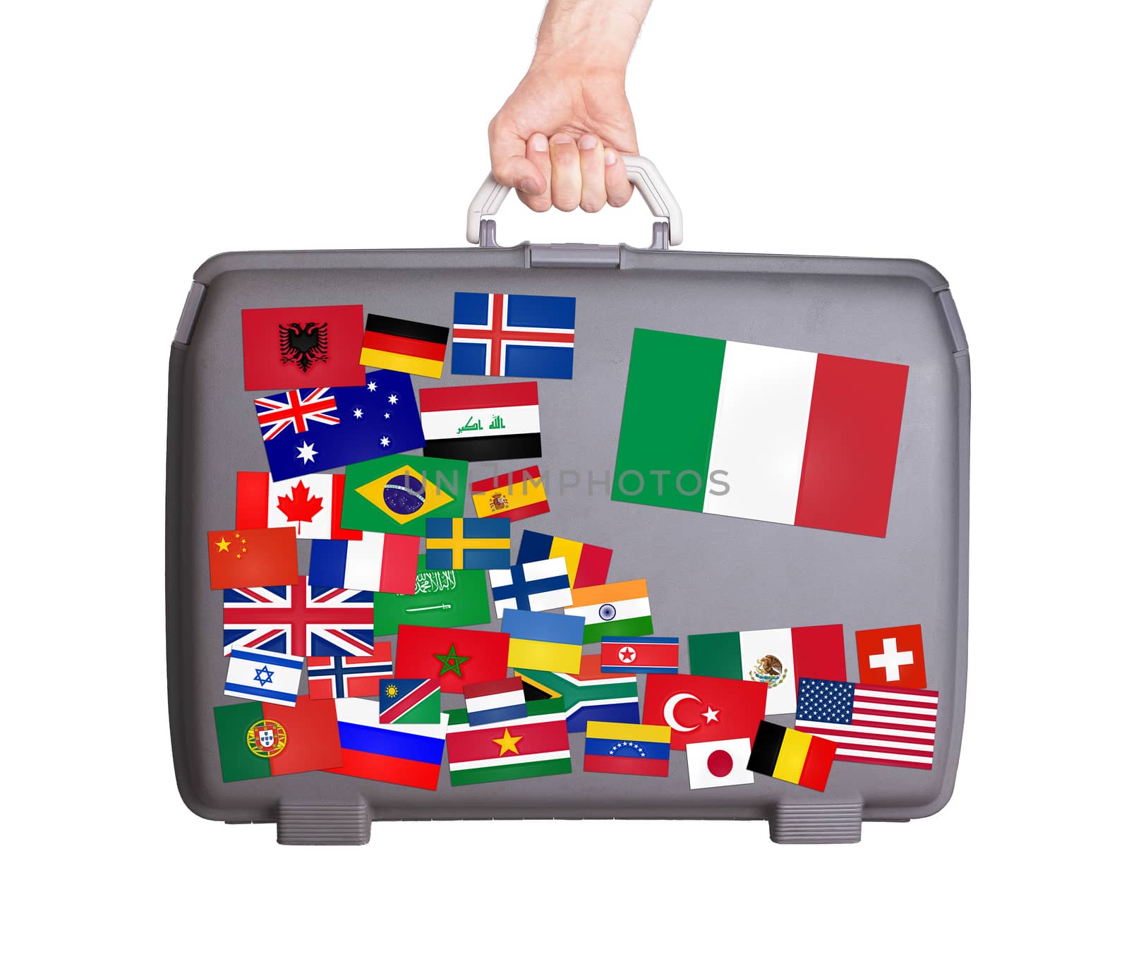 Used plastic suitcase with lots of small stickers, large sticker of Italy