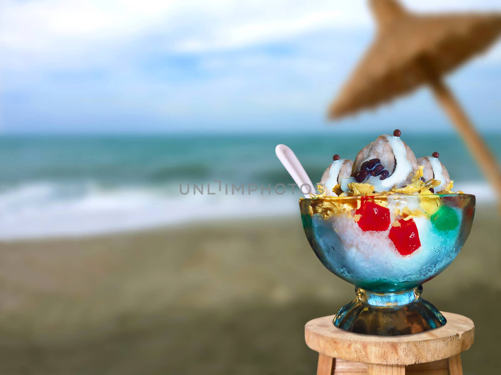 A tasty ice cream dessert shot in a beach on a hot summer day.