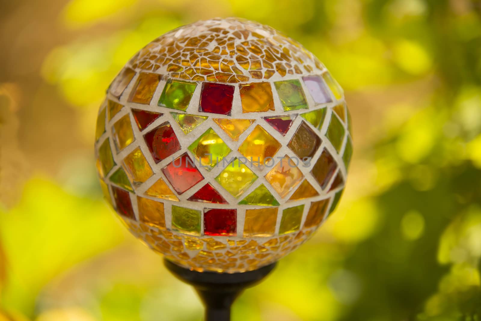 An orange mosaic solar lamp