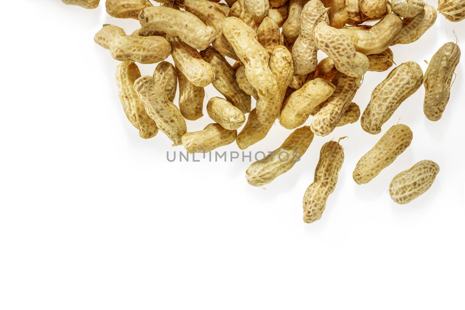 boiled peanuts on white background with copy space.