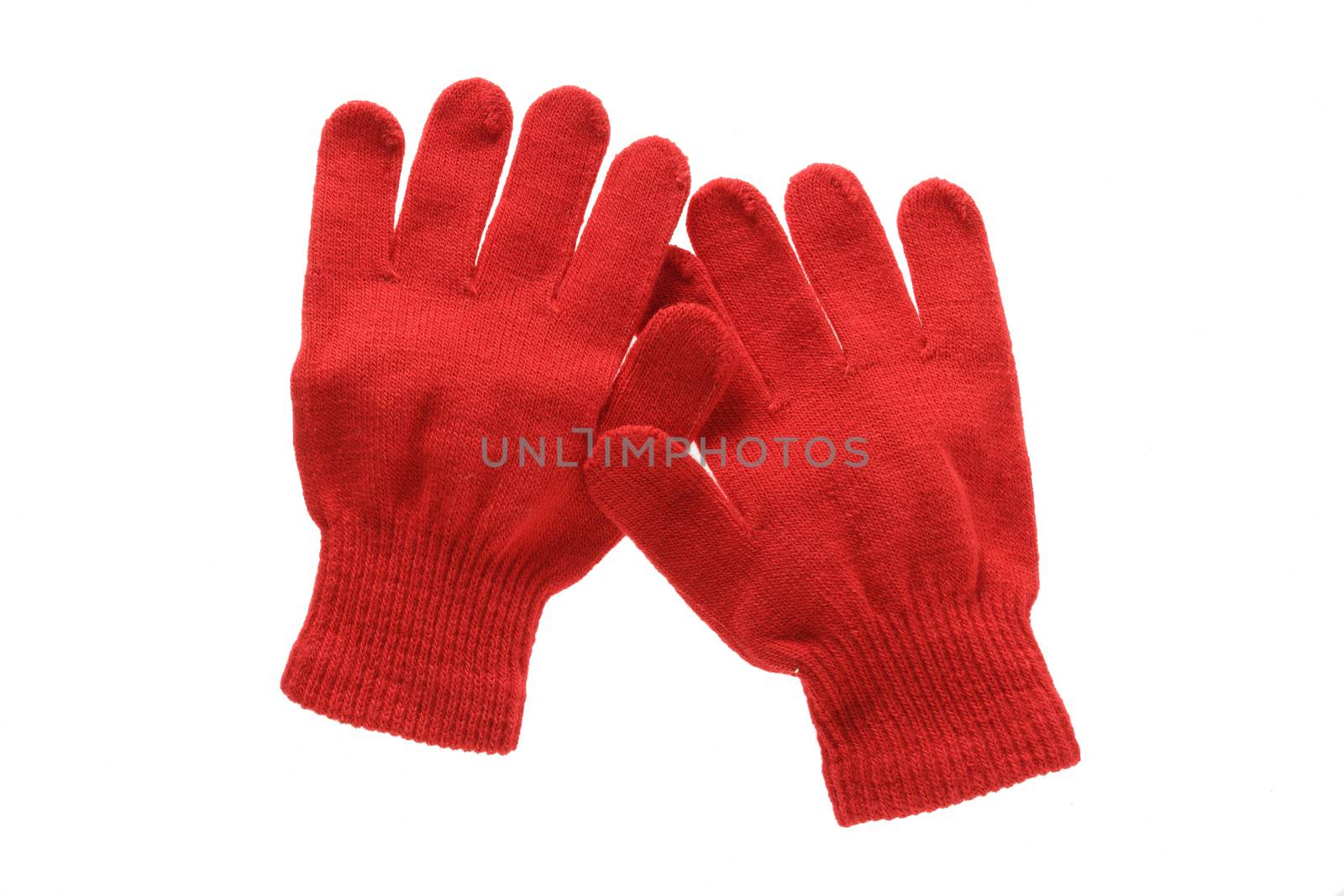 Red knitted cloth kid gloves with pattern  isolated on white background.
