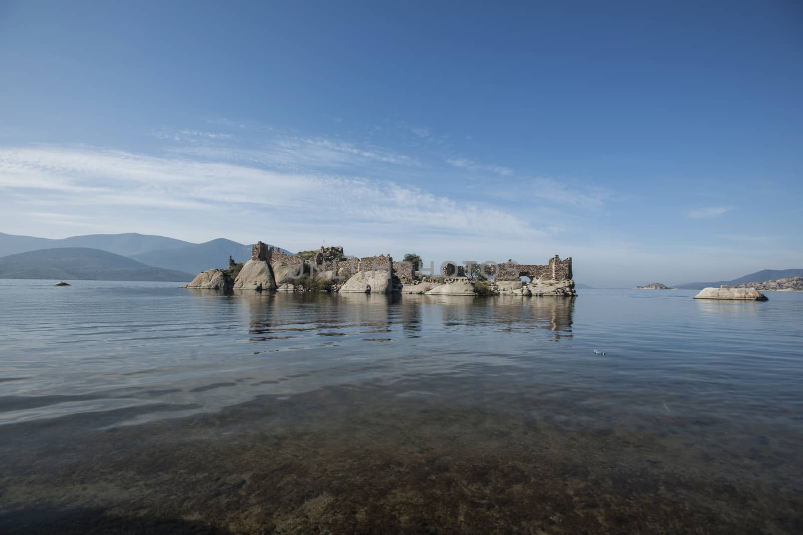 Lake Bafa Nature Park in Turkey, near Aegean Sea. Ancient Greek city Heraclea ruins can be seen all around the lake. 