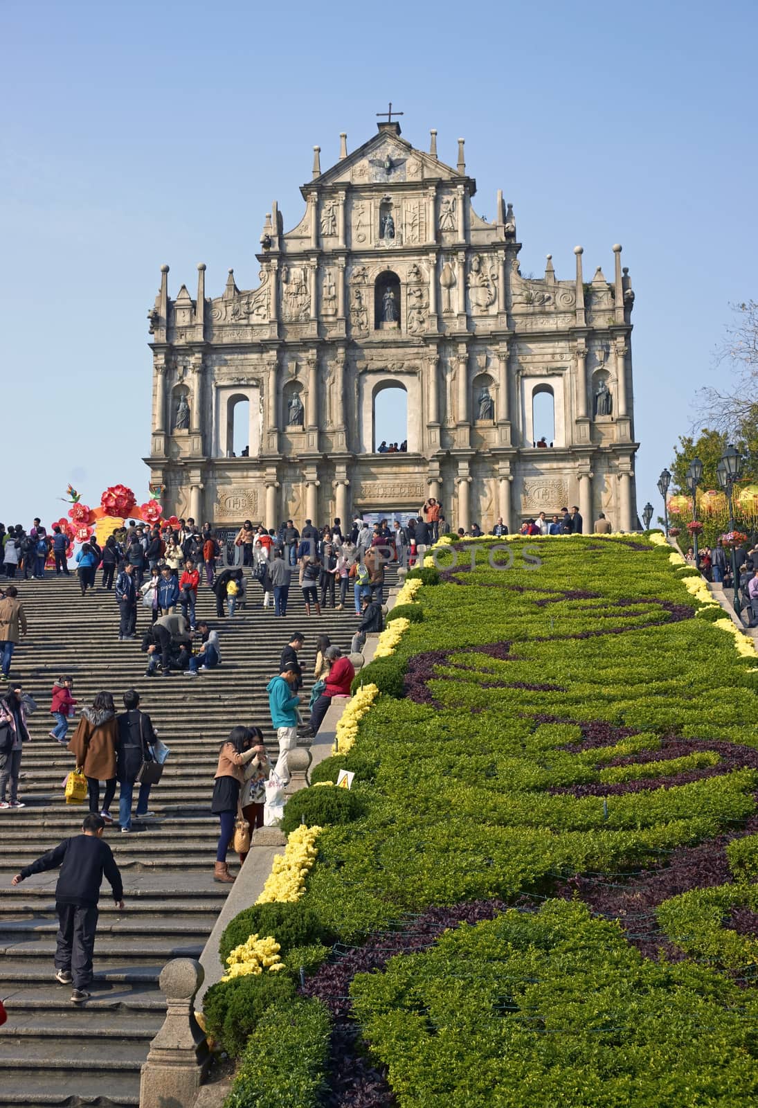 Climbing steps to the ruined facade of St Paul's Church in Macau, China