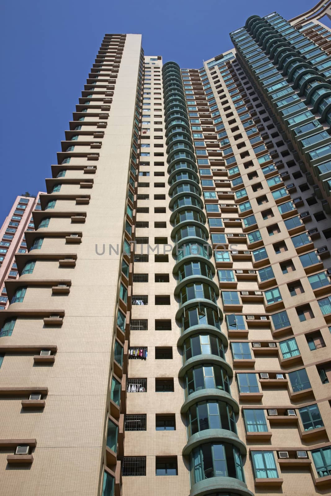 Tall residential tower block in the city of Hong Kong, China