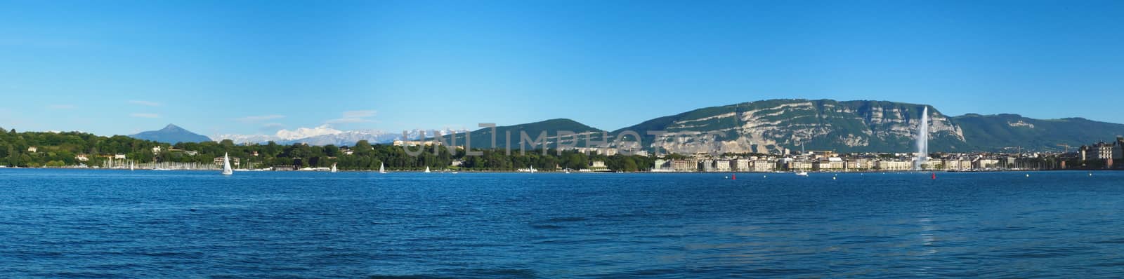 Panoramic view of Geneva area with the fountain, lake, Saleva and Alps mountains (Mont-Blanc) by beautiful day, Switzerland