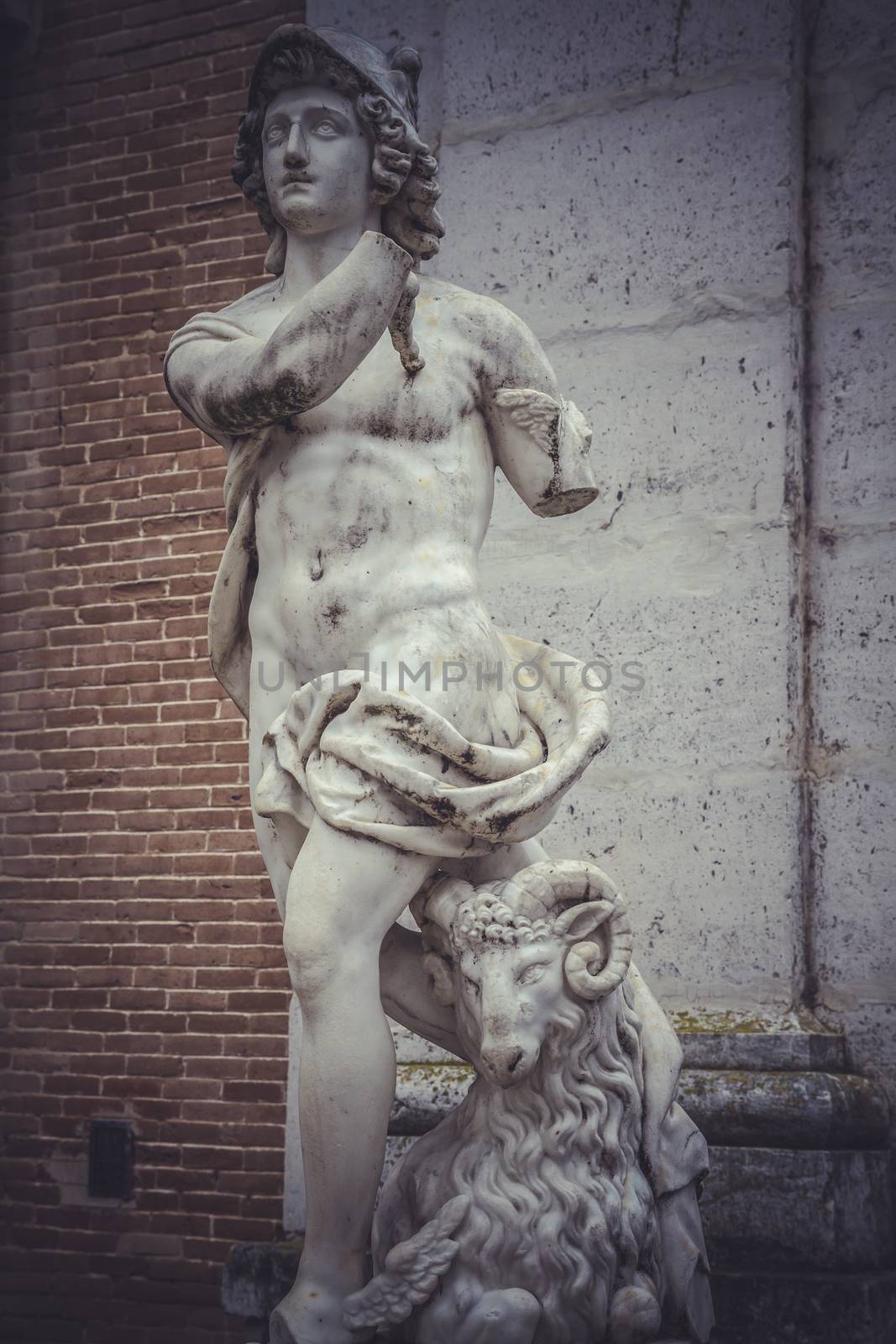 Ornamental fountains of the Palace of Aranjuez, Madrid, Spain.Wo by FernandoCortes