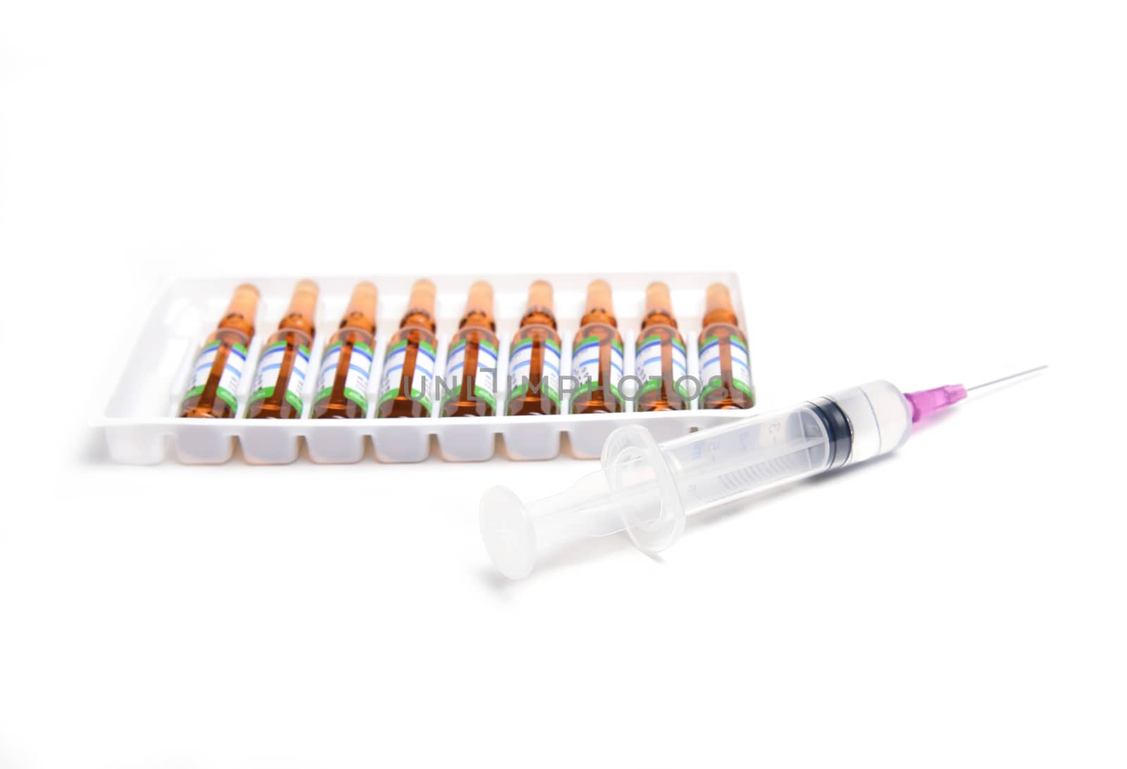 ampule and syringe and on white table