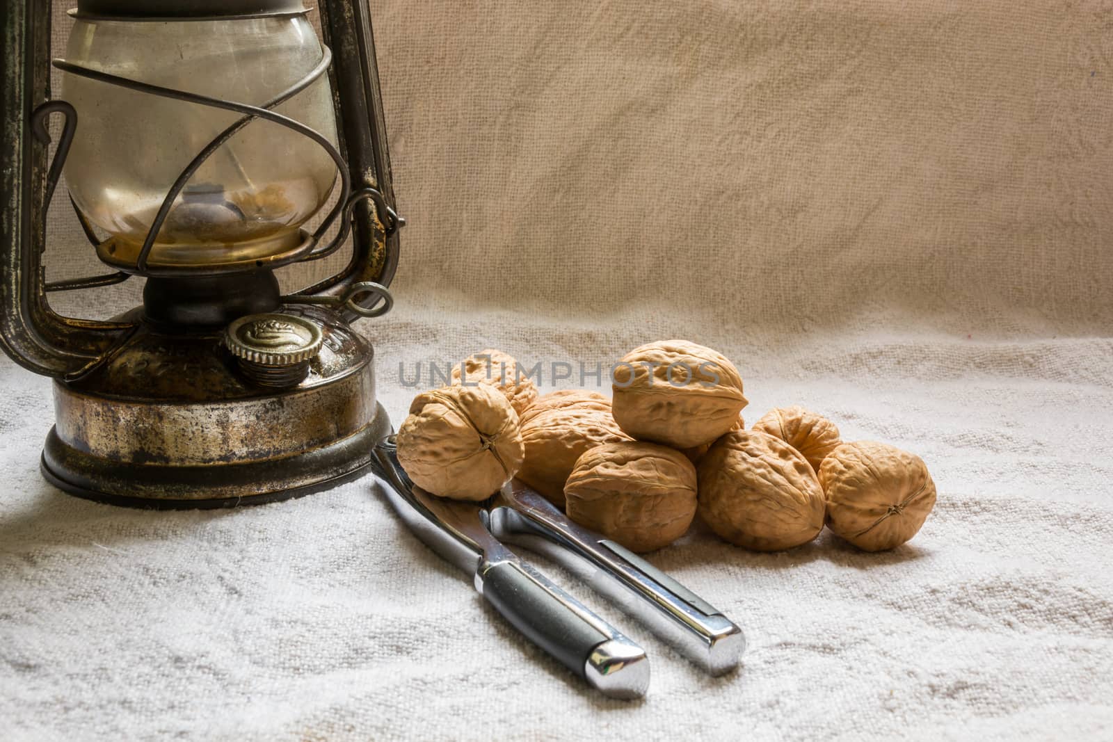 Set with some walnuts, a nutcracker and a lantern