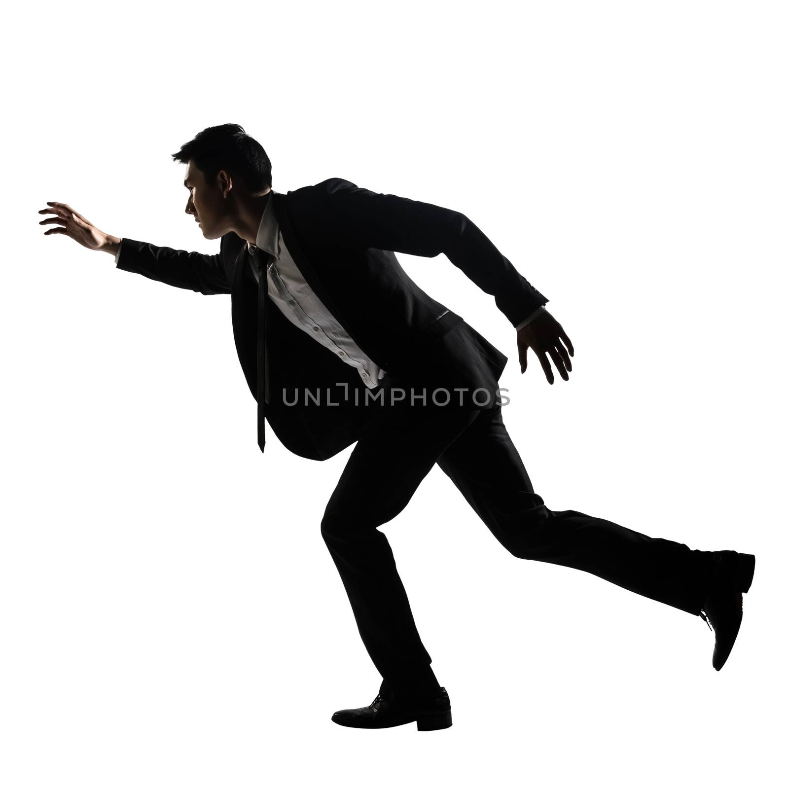 Silhouette of Asian business man running, full length portrait isolated on white. Side view.