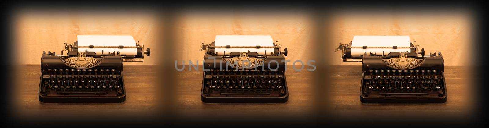 Old typewriter on wooden table by michaklootwijk