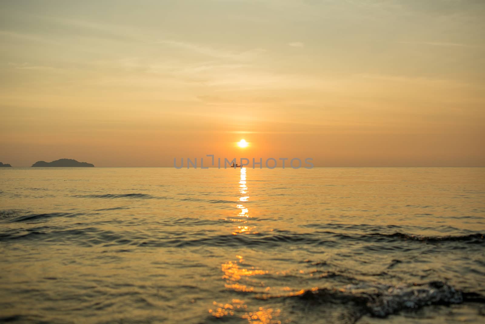 The lonely boat in the sea.