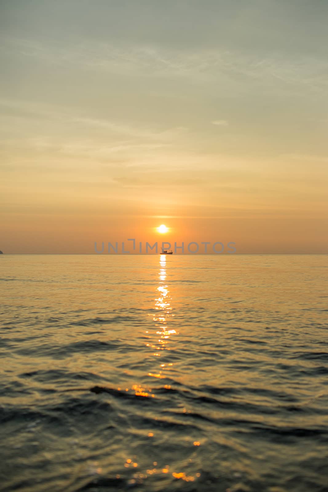 The lonely boat in the sea.