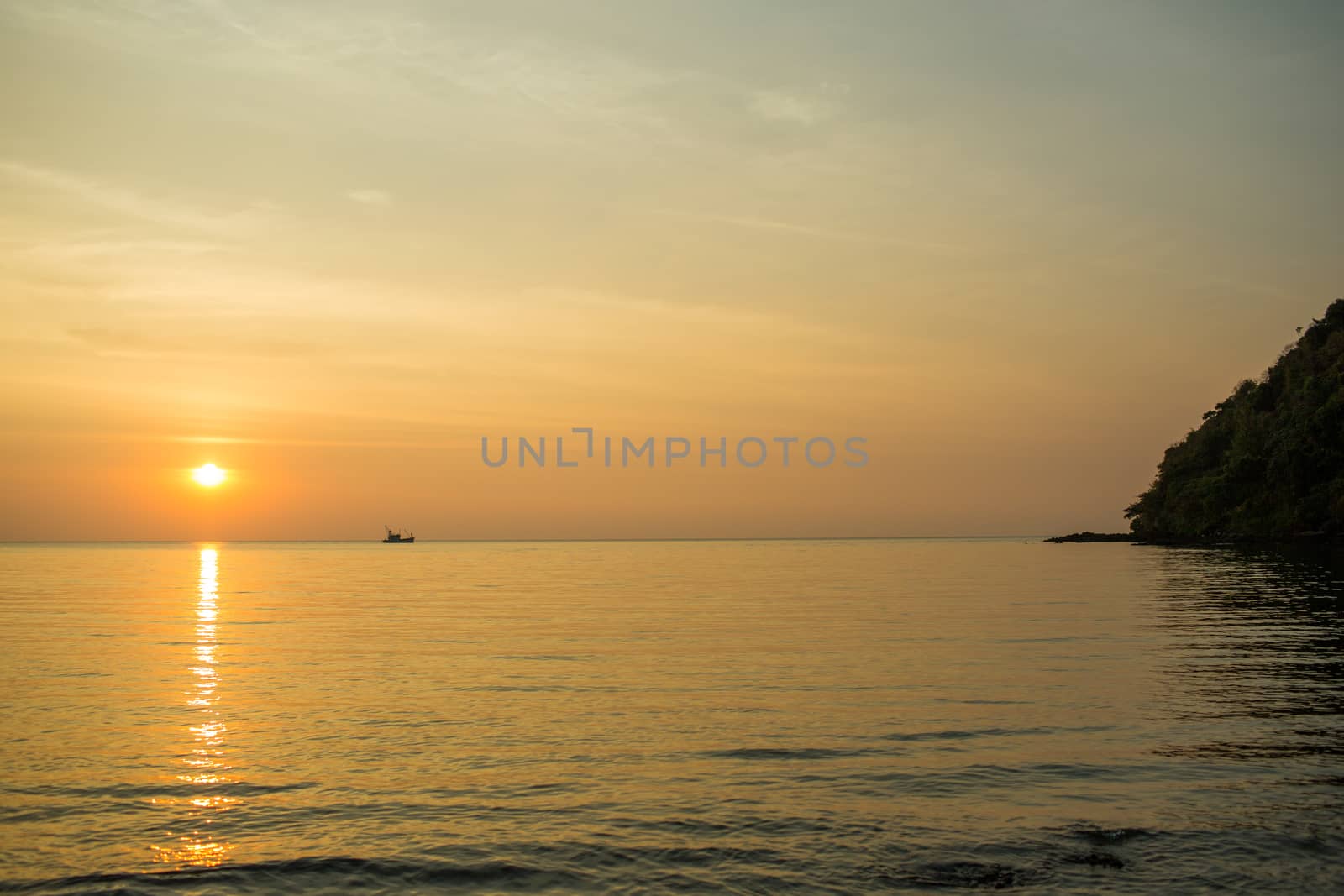 The lonely boat in the sea.