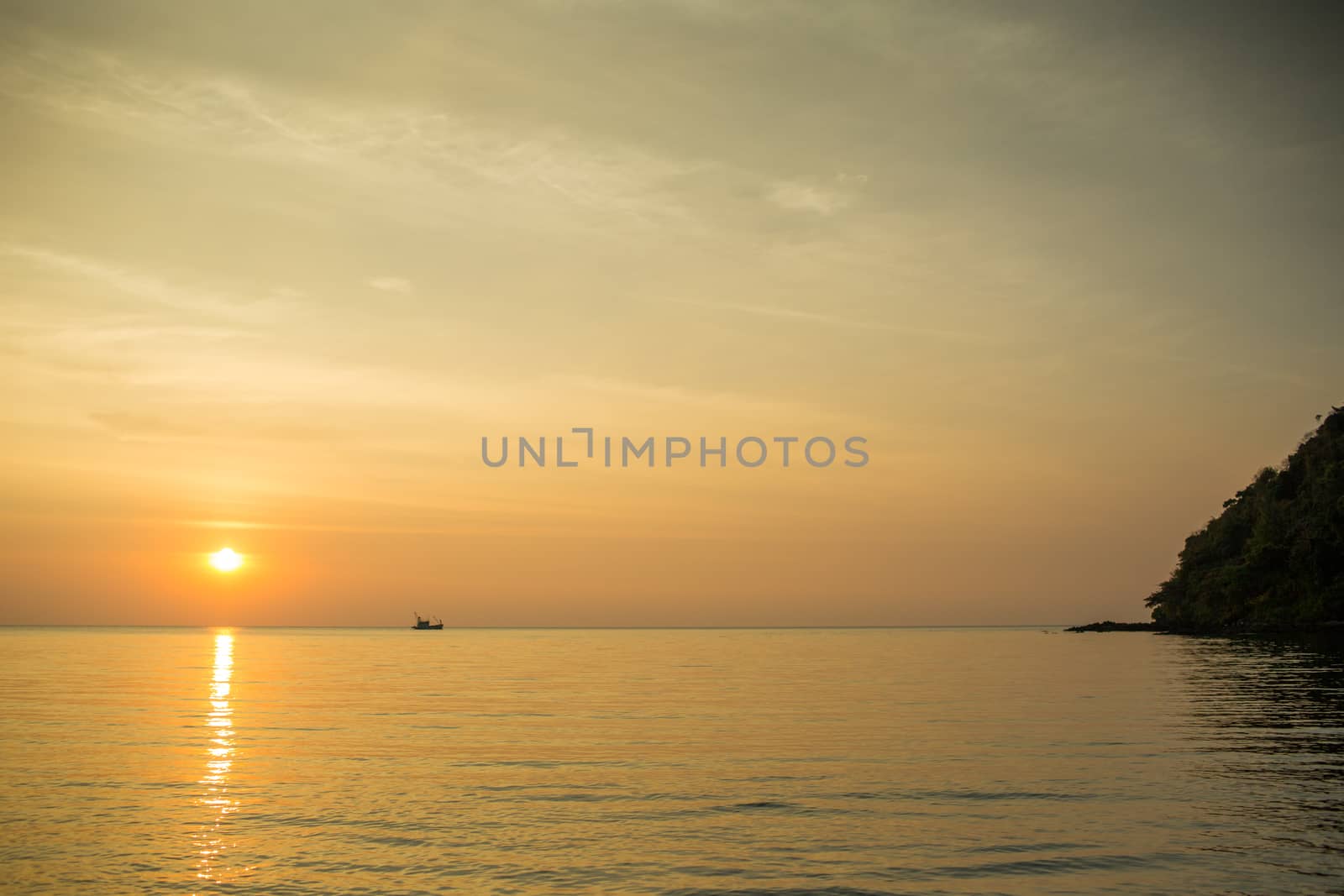 The lonely boat in the sea.