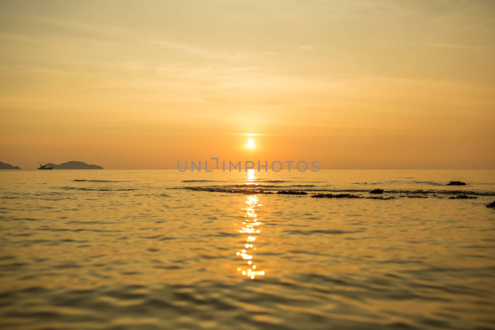 The lonely boat in the sea.