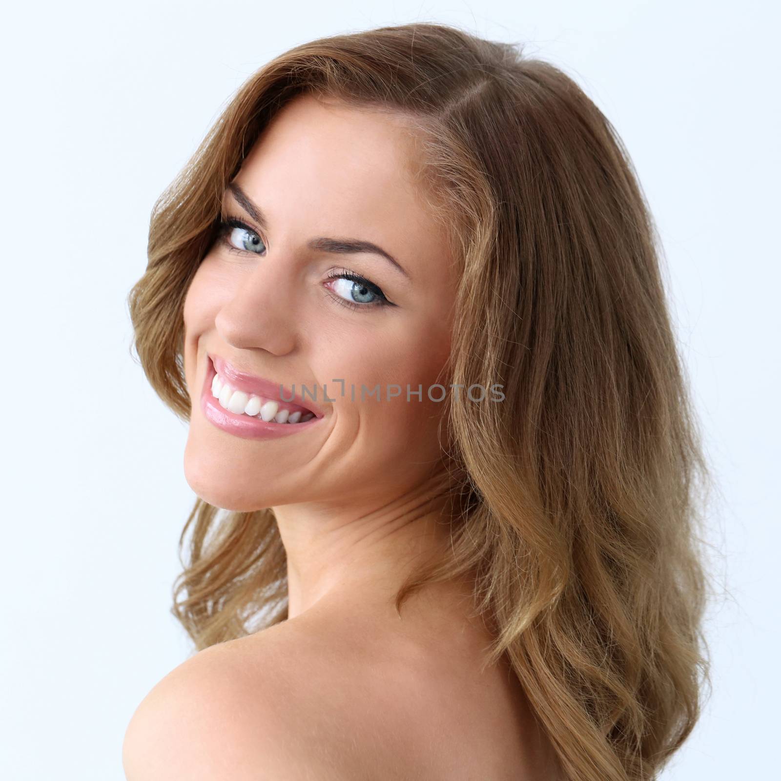 Attractive, beautiful woman with wide smile