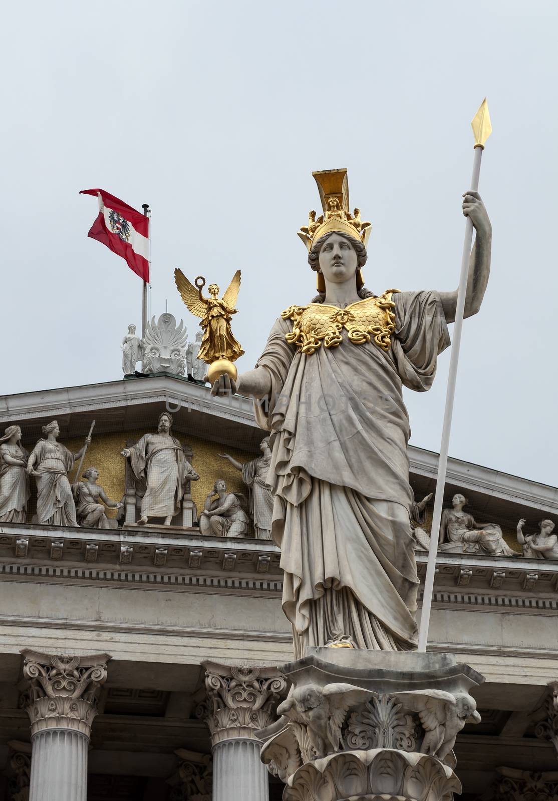 Statue of Pallas Athena, Goddess of Wisdom, standing in front of the Austrian Parliament building in Vienna.