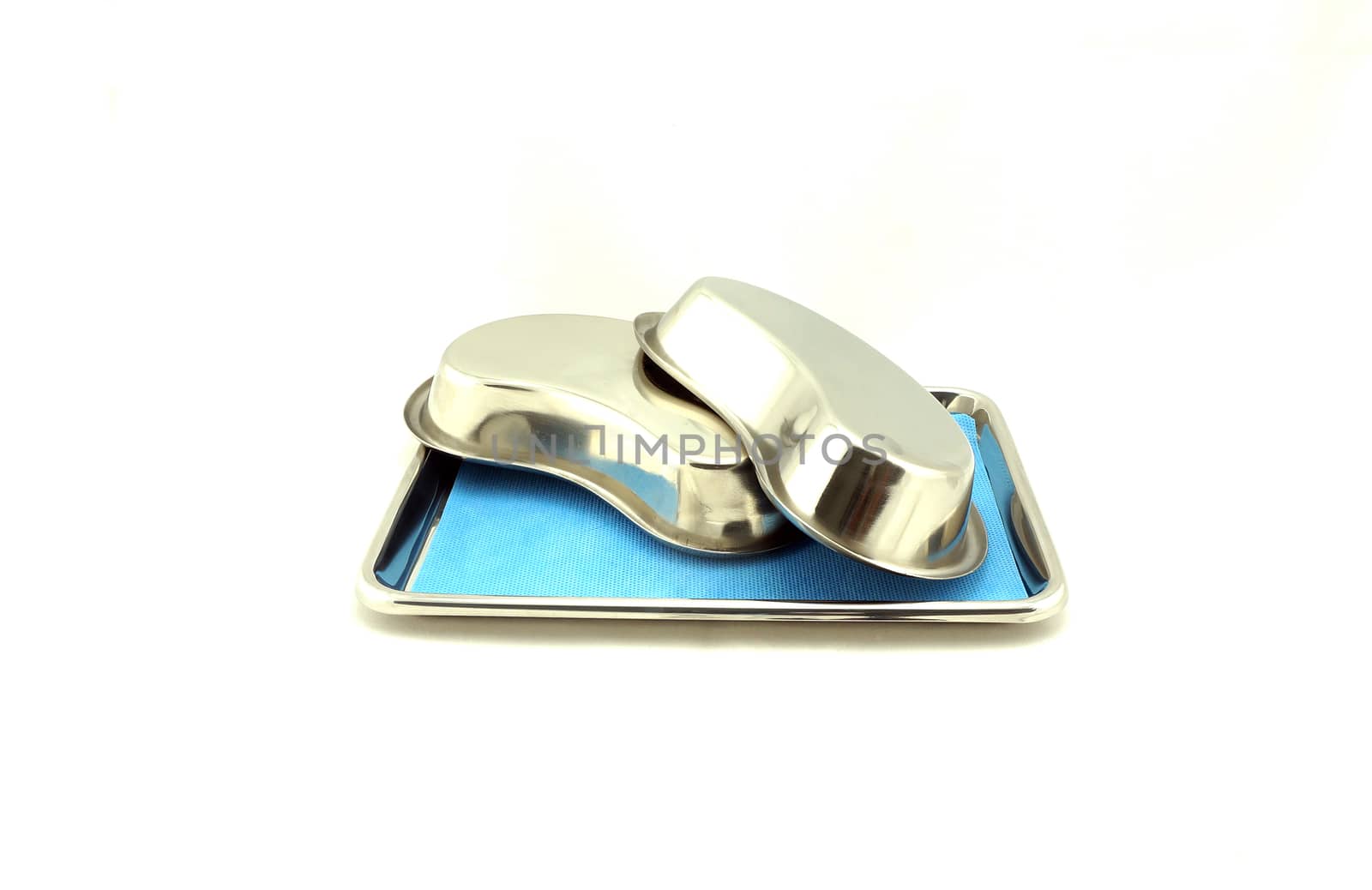 Two emesis basin or kidney bowl, stainless steel, placed in tray.                              