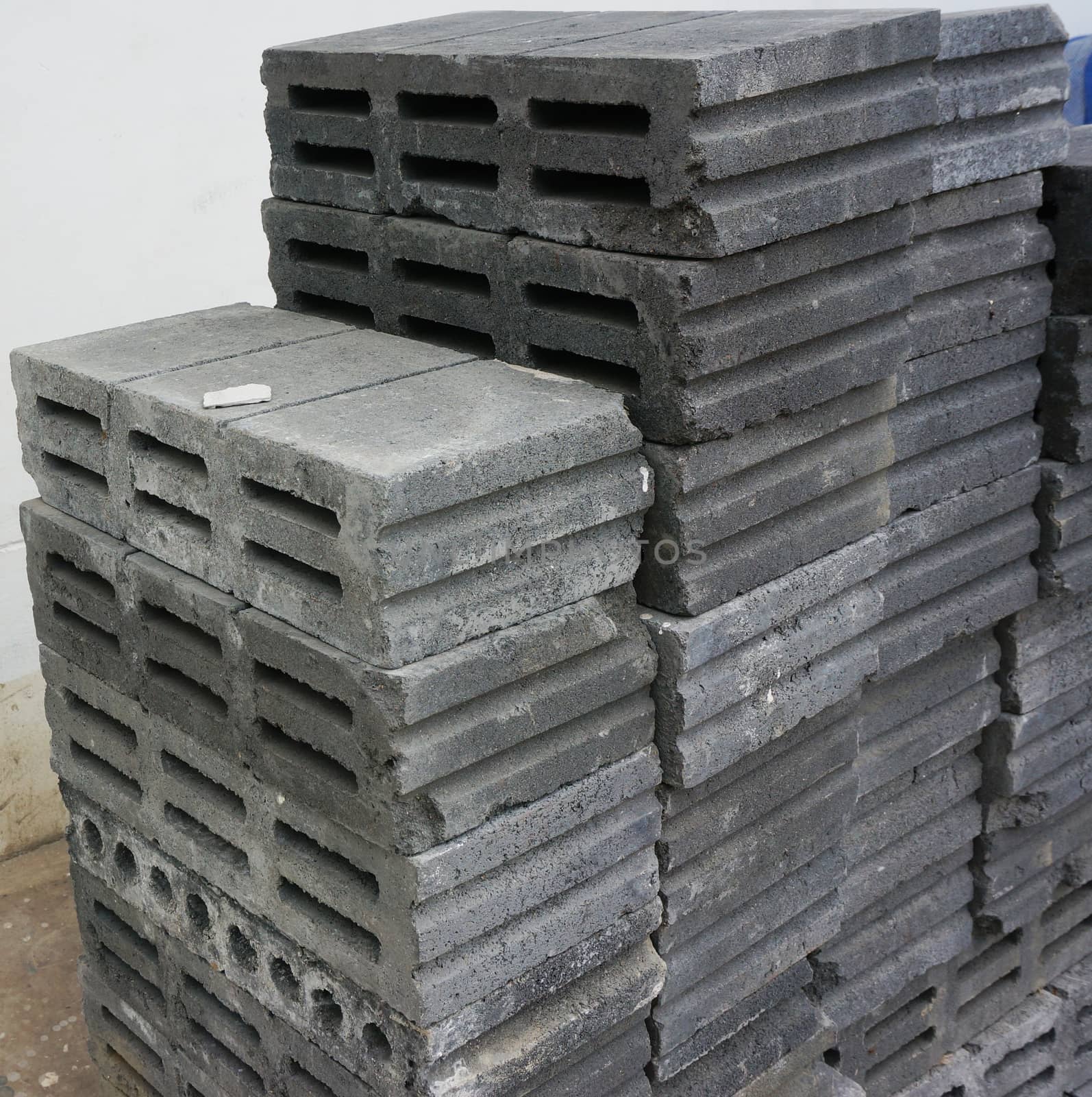 Gray brick block, laid overlap, prepared for home construction.                               