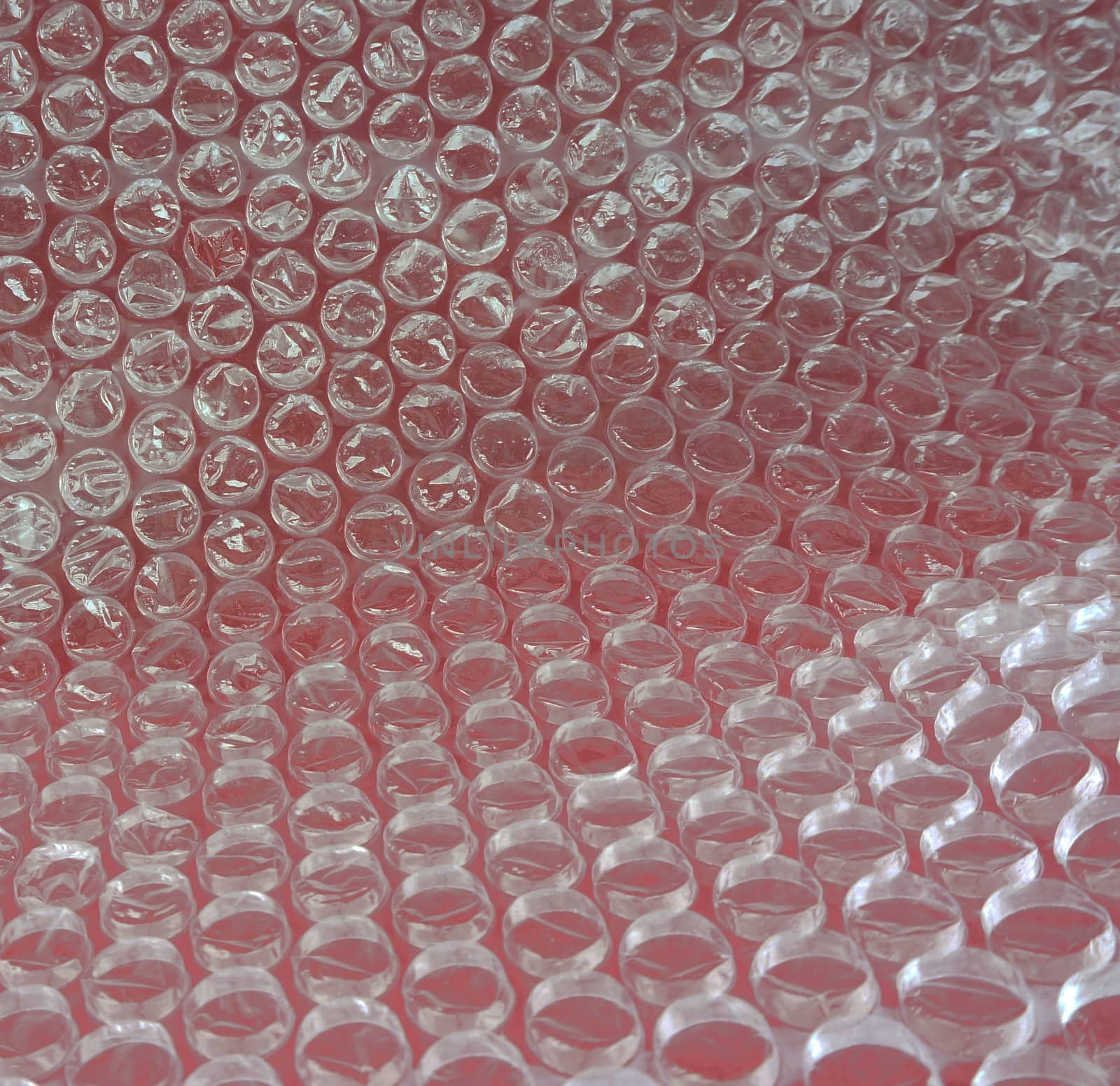 Bubble wrap, there are lots of bubbles blister to prevent shock.                            
