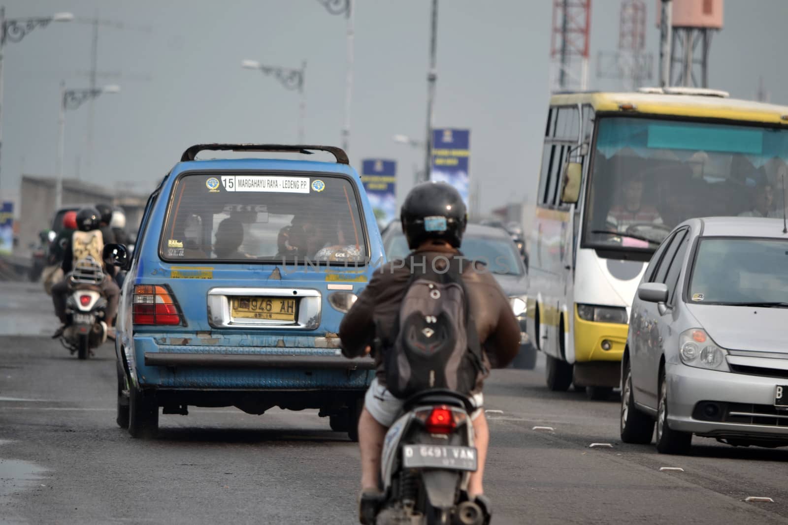bandung, indonesia-june 13, 2014-scenery of busy traffic in bandung city, west java-indonesia