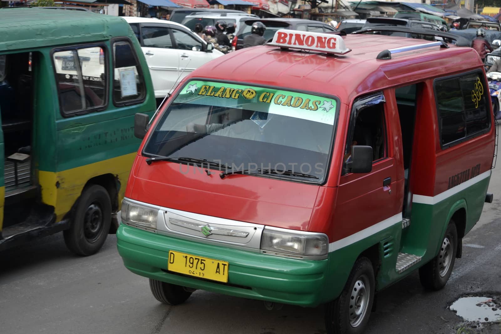 bandung, indonesia-june 13, 2014-public transportation in bandung city called angkot