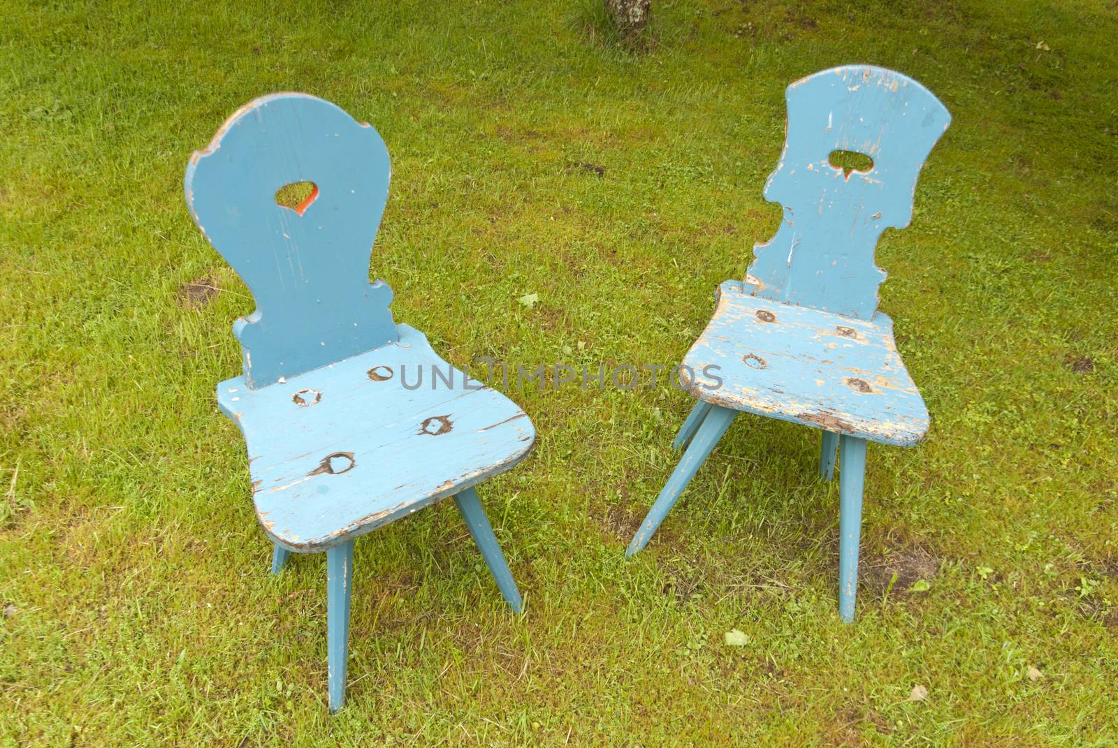 Two old Chairs on Grass