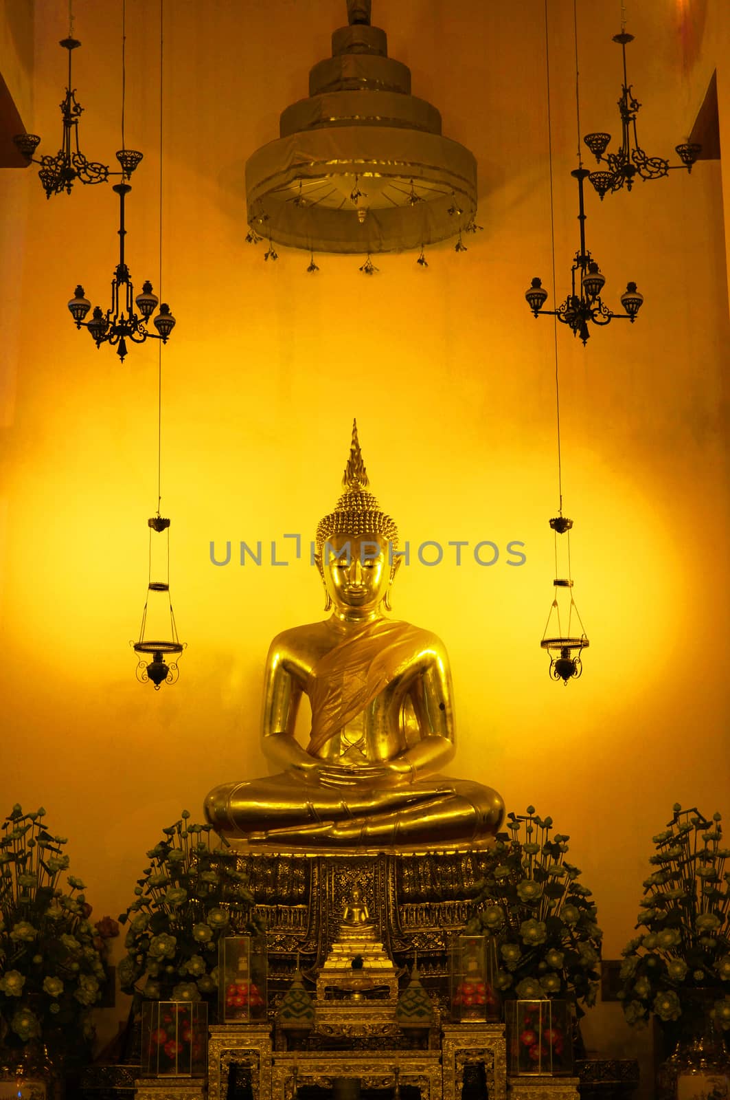 Holy Buddha Respected in Thailand Located at Wat Pho. Lord looks gorgeous, golden color.