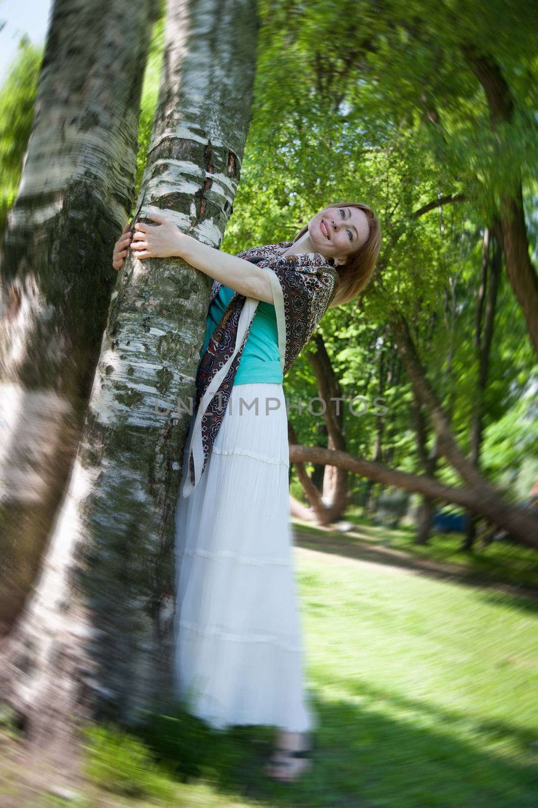  beautiful woman at a tree in summer by raduga21