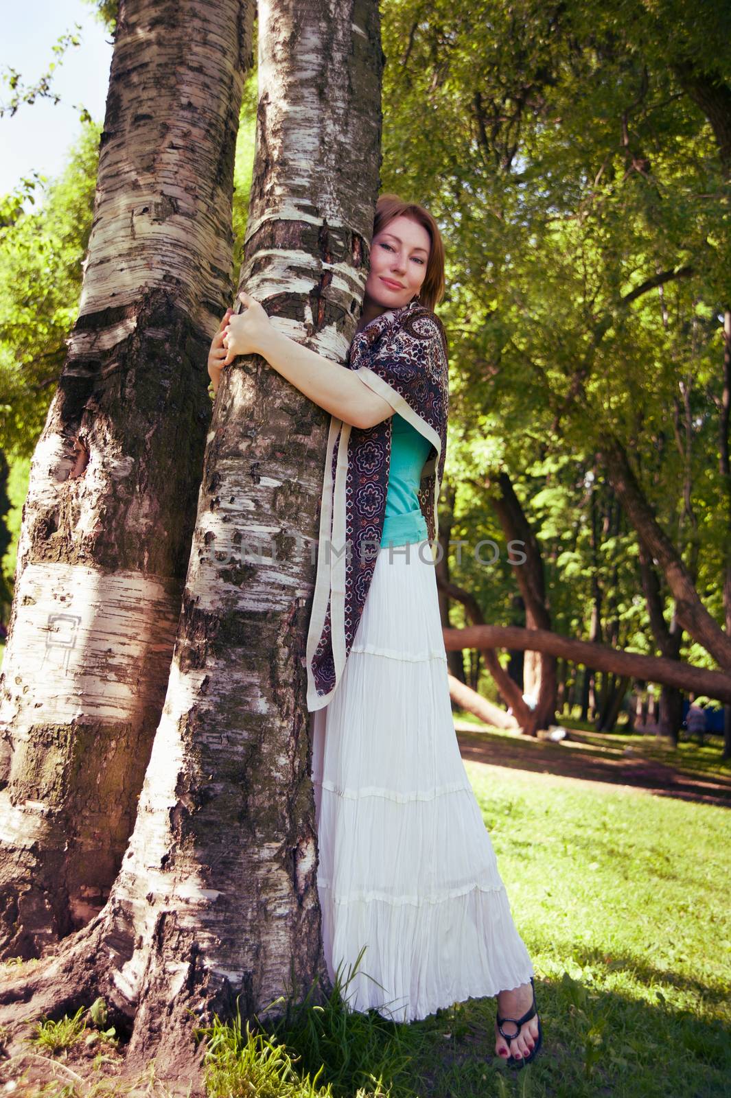  beautiful woman at a tree in summer by raduga21