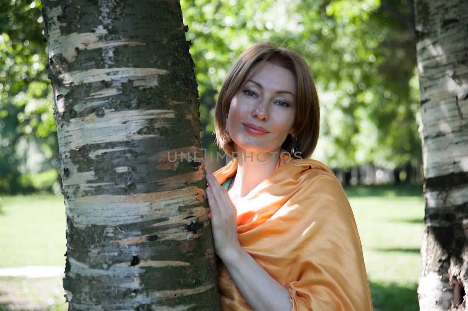  beautiful woman at a tree in summer by raduga21