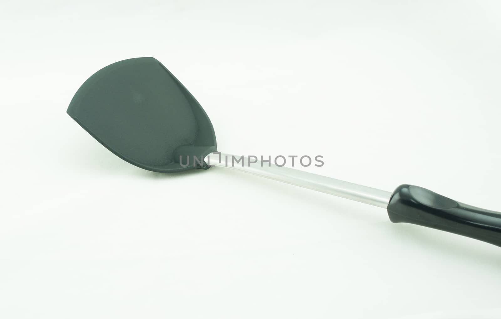 Kitchen spatula, kitchen utensil, the scoop and handle made plastic, the center shaft made from stainless steel.                                