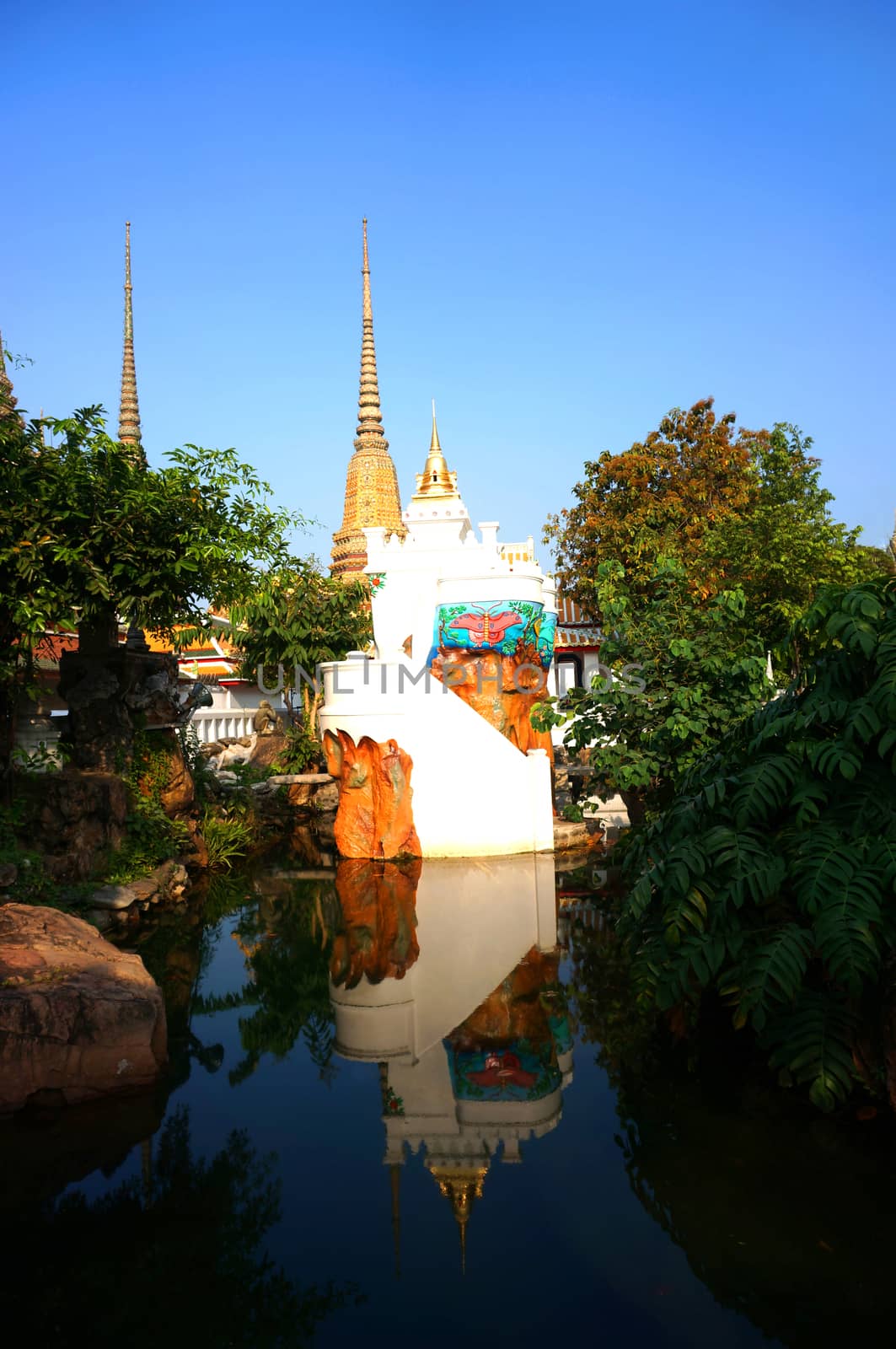 Water tower with reflection in Wat Pho temple, is a perfect architectural design. , Is naturally beautiful.                            