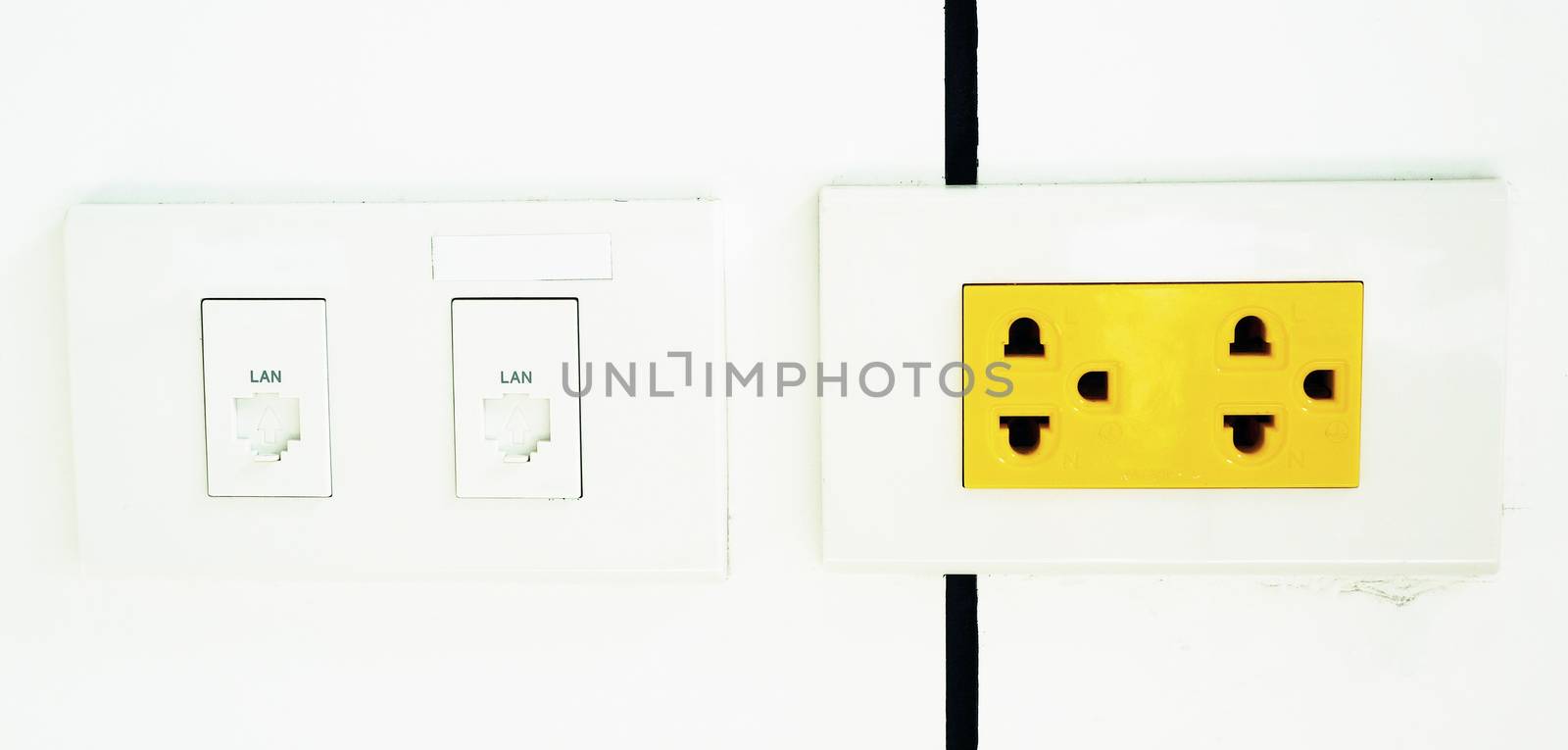 electrical outlet, yellow color is a sign that if the arbitrary power outage, has the power flow throughout machine at any time.                               