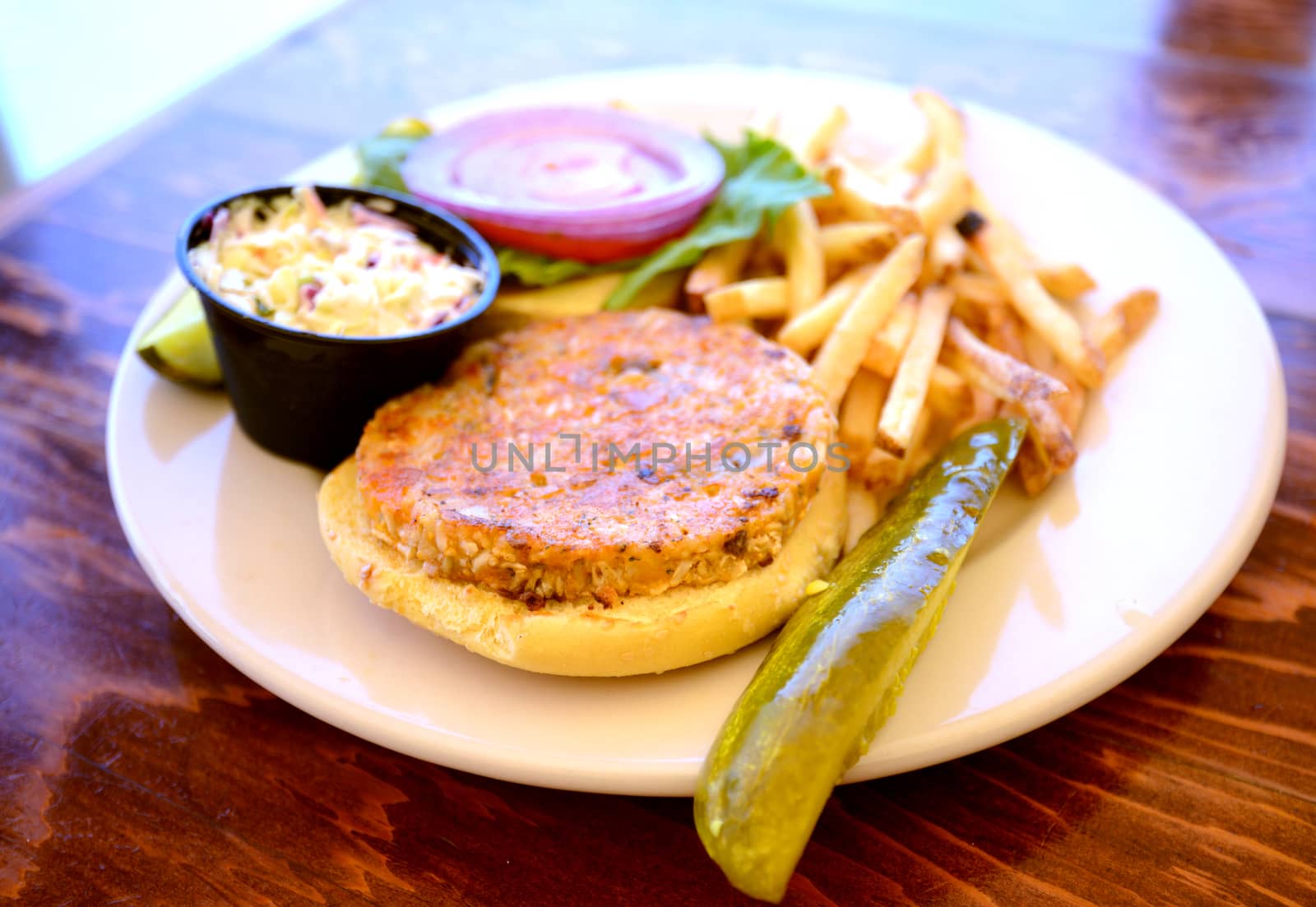 vegan meal of veggie burger and fries