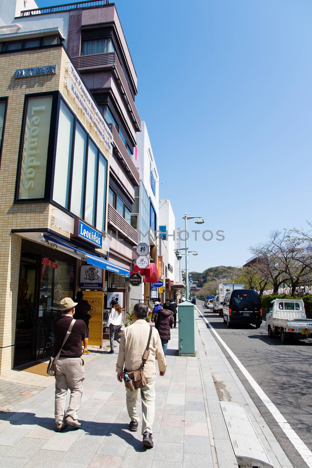 KAMAKURA,JAPAN - APRIL 14: Tourists walk on the street, Unidentified people walk around the street near Tsurugaoka Hachimangu Shrine on April 14, 2014 at Kamakura,Japan