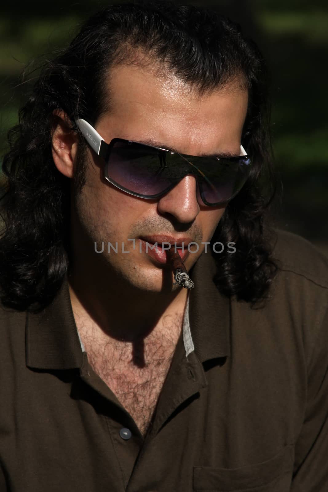 Person Smoking a Cigar by MichaelFelix