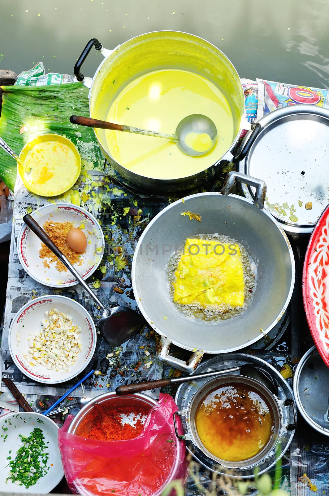 Thai People Cookiing Stuffed Crispy Egg-crepe or Vietnamese style Omlet