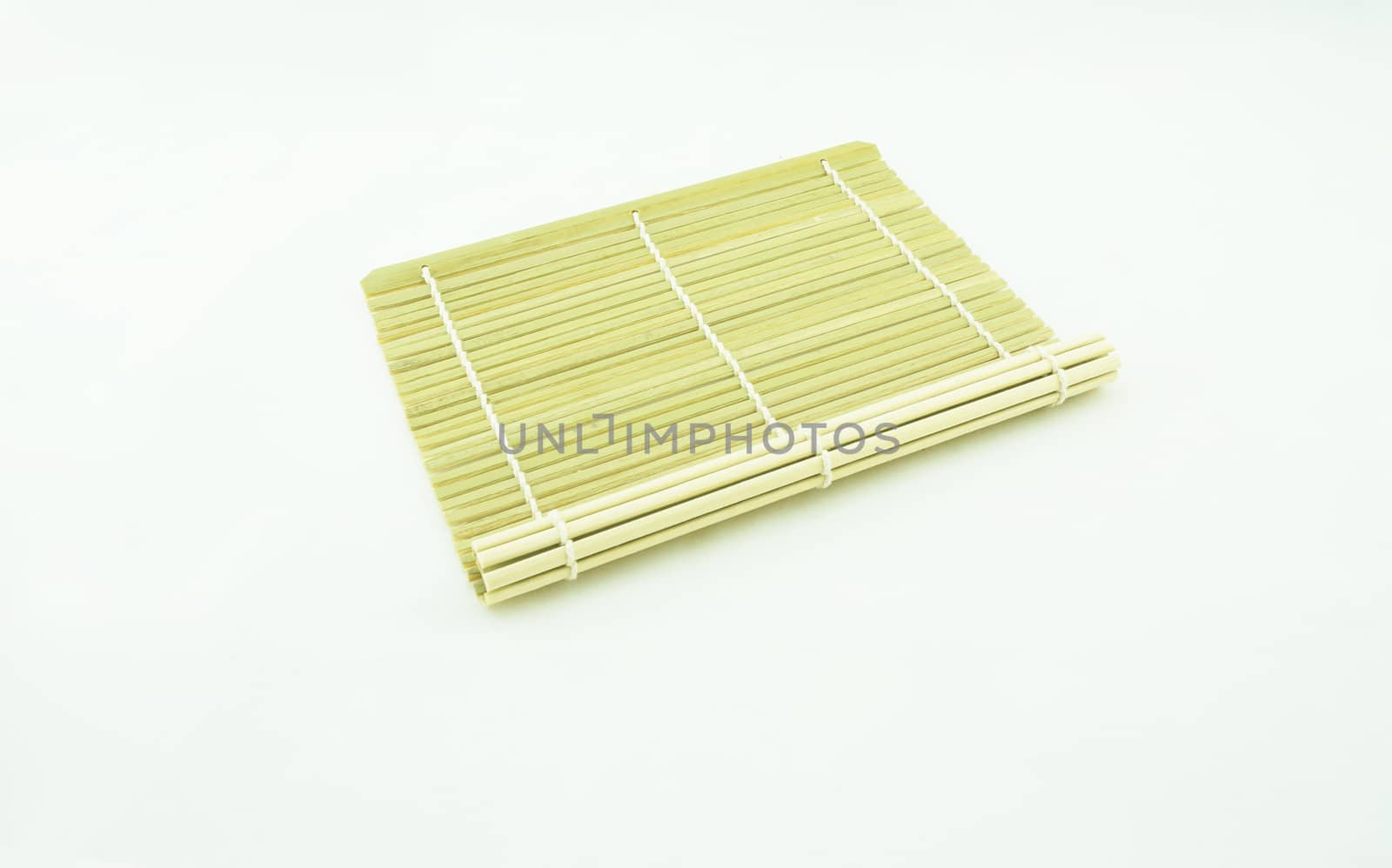 Bamboo tablecloth with clipping path cut into small pieces then the sequence and tie together with string.                                