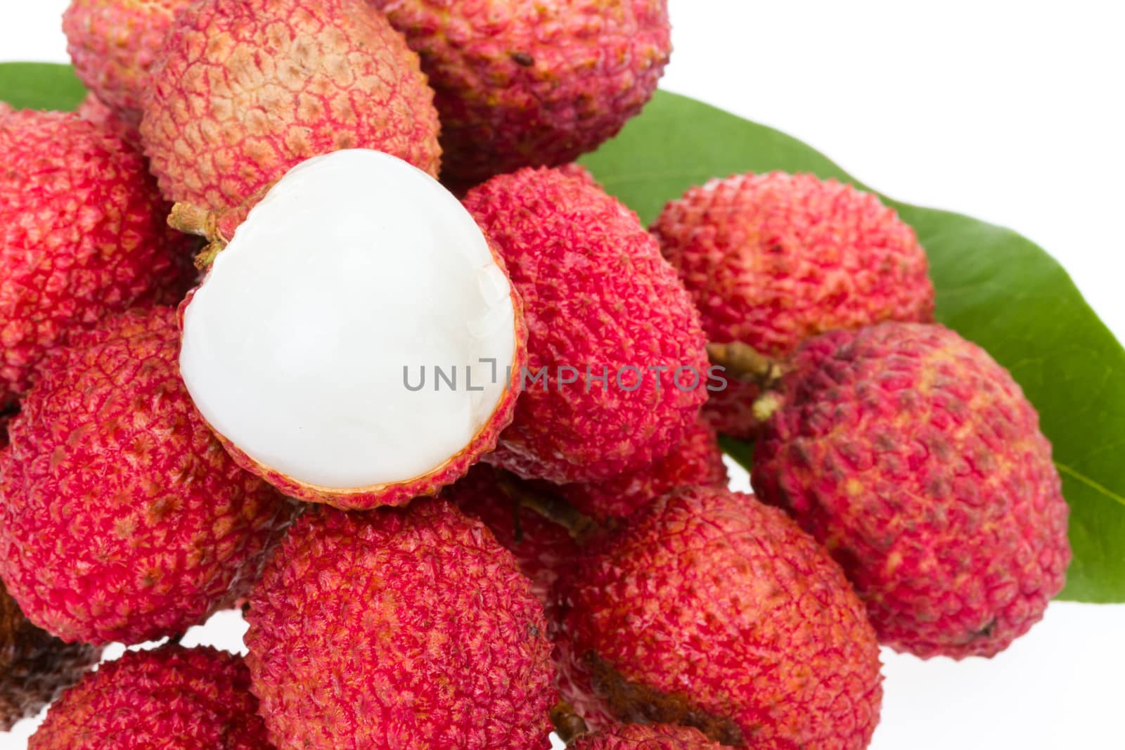 bunch of fresh lychee with leaf on white background