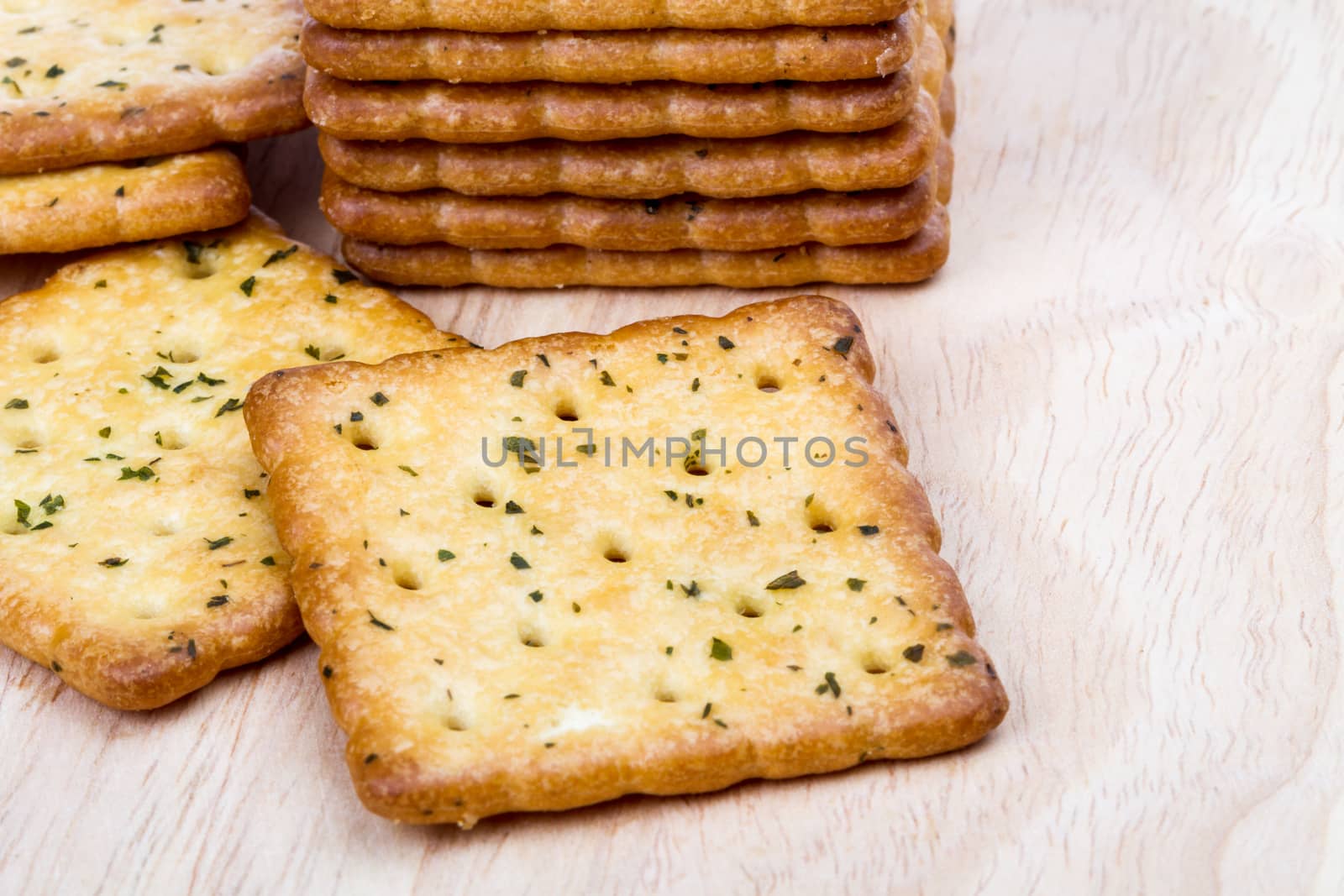 Vegetable cracker on wooden background