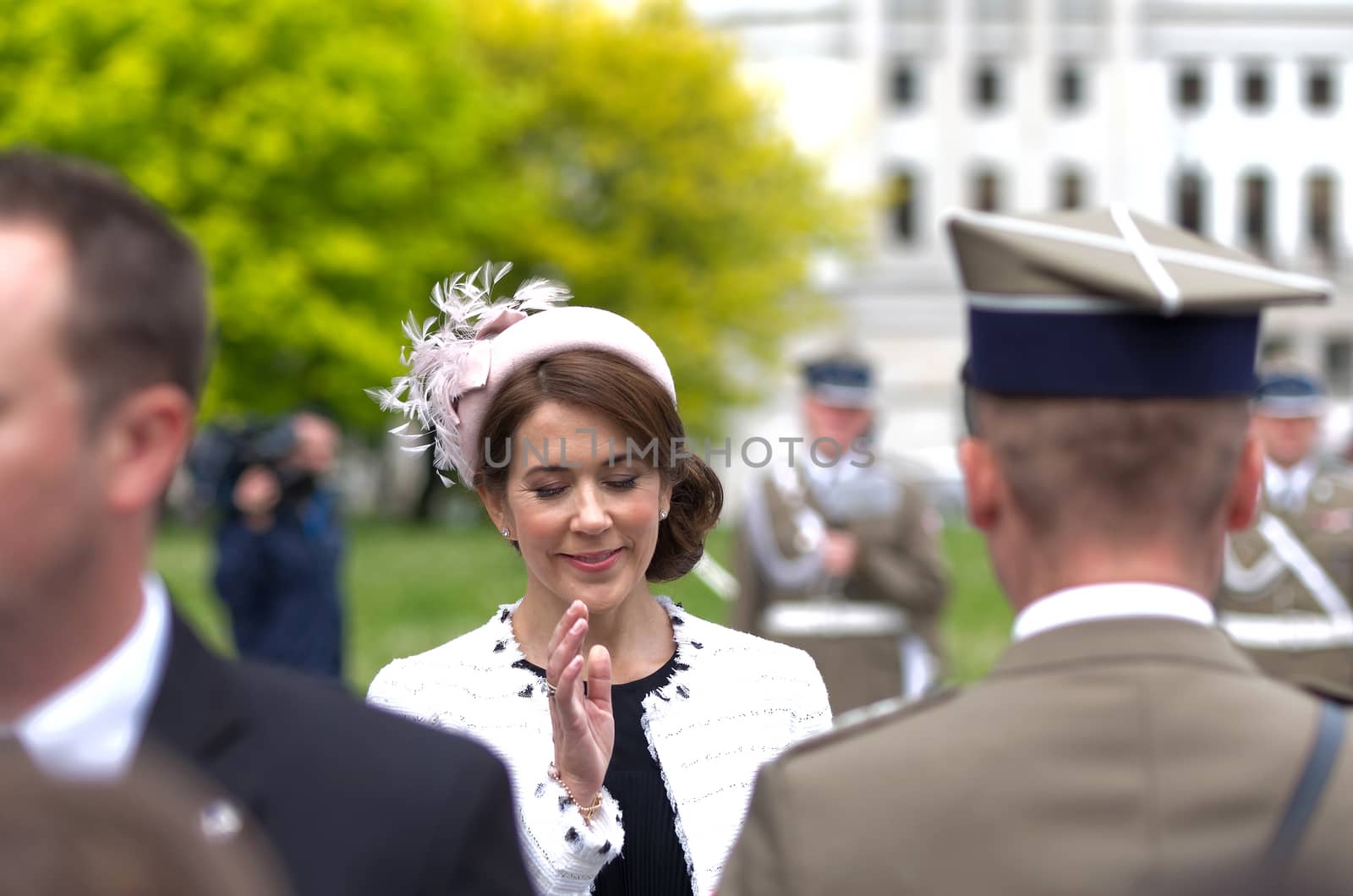Warsaw, Poland - May 12, 2014: Danish Crown Prince Couple on state visit to Poland. Princess Mary Elizabeth waves during the wreath laying ceremony.