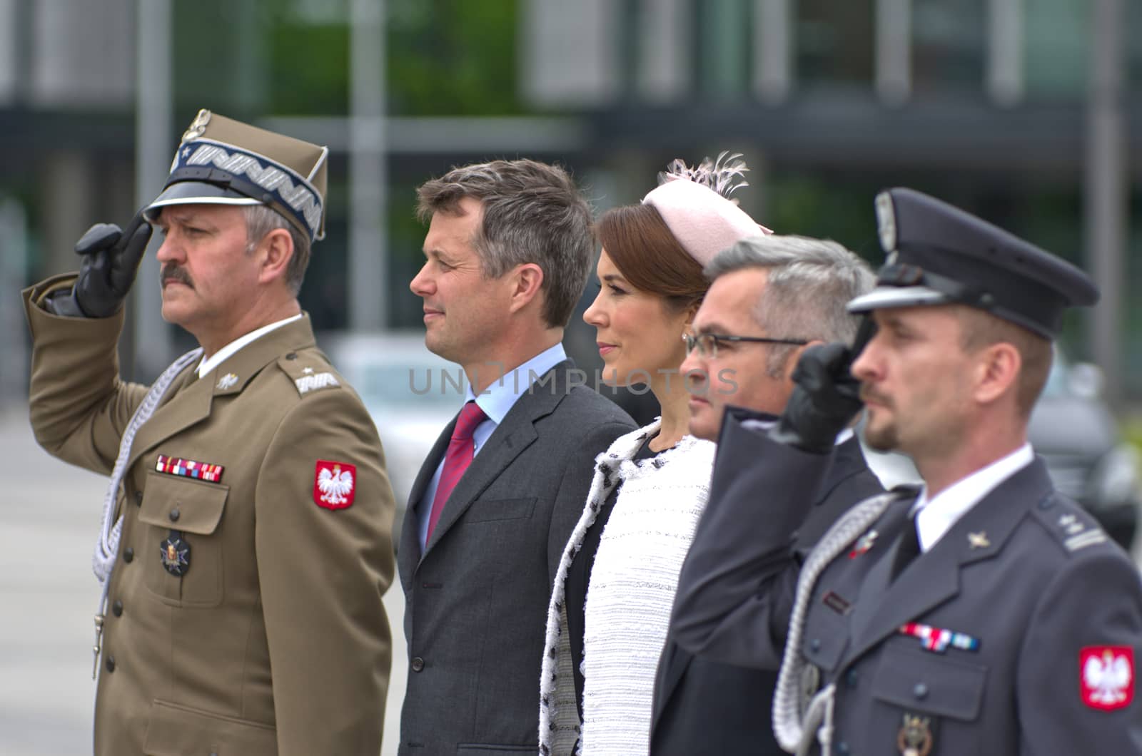Warsaw, Poland - May 12, 2014: Danish Crown Prince Couple on state visit to Poland. Crown Prince of Denmark Frederik and Crown Princess Mary during the wreath laying ceremony.