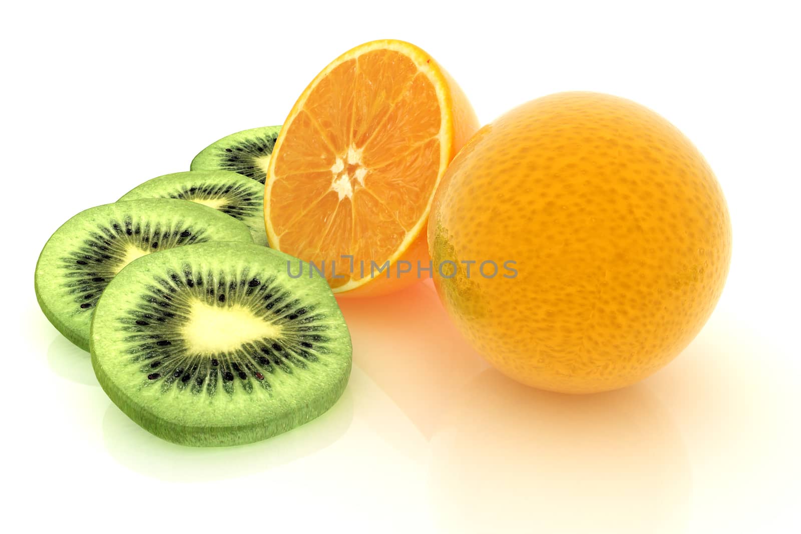 slices of kiwi, orange and half orange on a white 